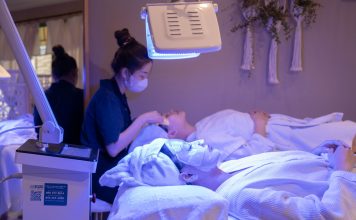 Ethos Aesthetics Hosts VIP Summer Event in Hoboken Patients receiving LED light therapy and facial treatment in a spa setting.