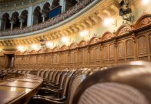 Interior view of the elegant Swiss Parliament council chamber in Bern, Switzerland.