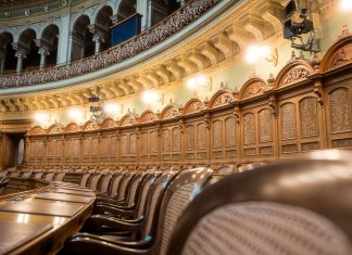 Interior view of the elegant Swiss Parliament council chamber in Bern, Switzerland.