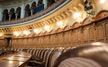 Interior view of the elegant Swiss Parliament council chamber in Bern, Switzerland.