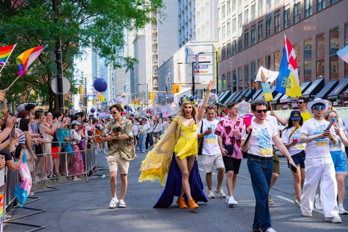 jersey-city-puerto-rican-parade-and-festival-set-f Colorful Pride Parade with diverse participants celebrating in Toronto's vibrant streets.