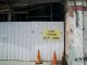 Jersey City’s Big Promises That Went Nowhere Abandoned building site with a warning sign and orange cones.