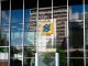 Modern building exterior in Brasília, Brazil, featuring reflective glass and iconic Banco logo.
