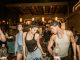 La Bohème Hosts First Saint-Tropez Night in Hoboken Group of young adults enjoying a lively night out at a trendy Indian bar with friends.