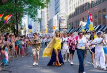 Colorful Pride Parade with diverse participants celebrating in Toronto's vibrant streets.
