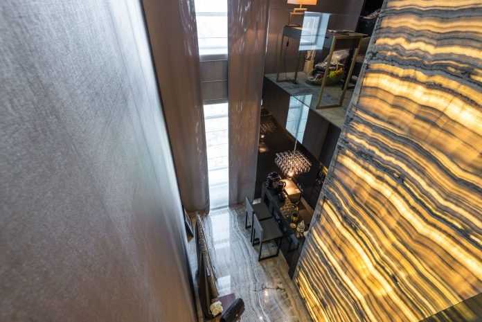 High-angle view of a modern interior featuring elegant lighting and design details.