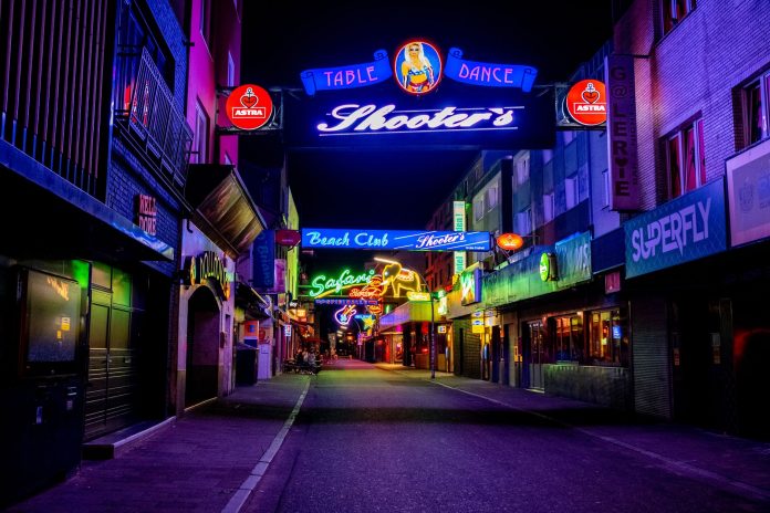 lucky-7-tavern-the-dive-bar-that-stays-true-to-jer Explore the vibrant neon-lit streets of Hamburg's famous Reeperbahn district at night.