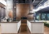 Luxury Duplex Approved Next to Massive Train Exhaust Vent in Jersey City Interior of contemporary spacious kitchen with stylish furniture in apartment with loft style