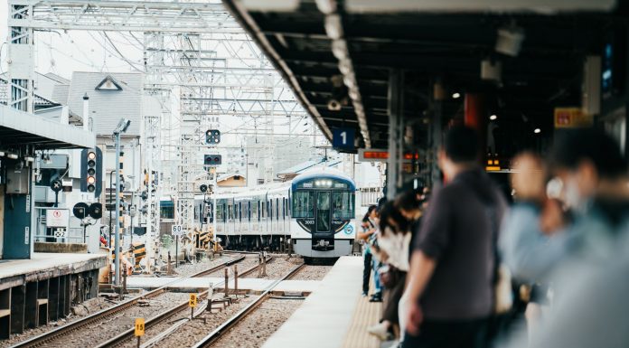 Marion Neighborhood Pushes Again for a PATH Station 45 Years in the Making A train arriving at a bustling Japanese station filled with waiting passengers.