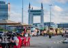 View of lively food truck area near the iconic Terengganu Drawbridge. Perfect for street food enthusiasts.