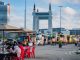 View of lively food truck area near the iconic Terengganu Drawbridge. Perfect for street food enthusiasts.