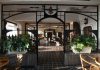 Punjab Meet House Brings Taste of Pre-Partition Punjab to Jersey City Charming boutique café with lush plants and refined décor creating a welcoming atmosphere.