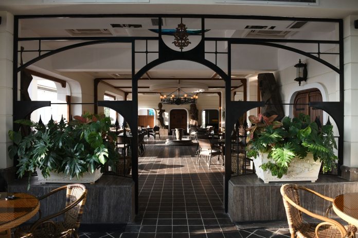 punjab-meet-house-brings-taste-of-pre-partition-pu Charming boutique café with lush plants and refined décor creating a welcoming atmosphere.