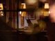 Romantic dining scene in a cozy restaurant with warm lighting and intimate atmosphere.