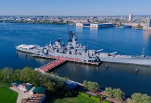 Stunning aerial shot of the USS New Jersey battleship docked in Philadelphia, Pennsylvania.