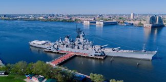 Stunning aerial shot of the USS New Jersey battleship docked in Philadelphia, Pennsylvania.