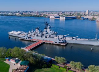 Stunning aerial shot of the USS New Jersey battleship docked in Philadelphia, Pennsylvania.