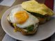 Try This Garlic Bread Avocado Toast Recipe at Home Tasty breakfast with fried egg and avocado on toast, ideal for food lovers.