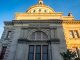 Detailed view of the historic Williamsburgh Savings Bank in Brooklyn, New York, captured at sunset.