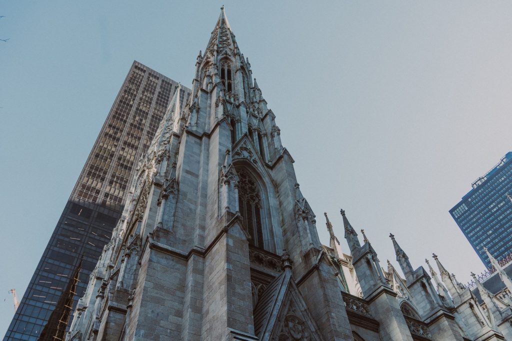 St. Patrick's Cathedral and nearby skyscrapers, showcasing Gothic architecture in New York City.