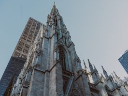 St. Patrick's Cathedral and nearby skyscrapers, showcasing Gothic architecture in New York City.