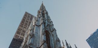 St. Patrick's Cathedral and nearby skyscrapers, showcasing Gothic architecture in New York City.