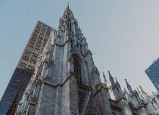 St. Patrick's Cathedral and nearby skyscrapers, showcasing Gothic architecture in New York City.