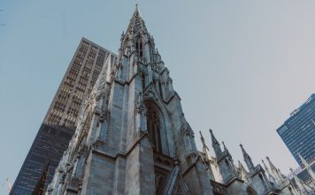 St. Patrick's Cathedral and nearby skyscrapers, showcasing Gothic architecture in New York City.