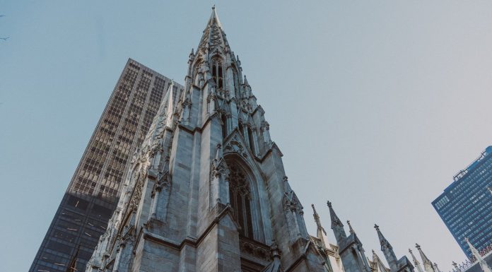 St. Patrick's Cathedral and nearby skyscrapers, showcasing Gothic architecture in New York City.