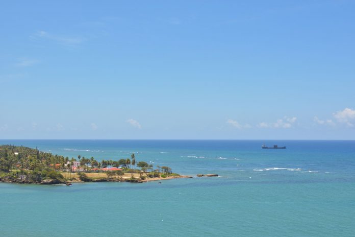 best-dominican-restaurants-elizabeth-nj Tranquil seascape of Puerto Plata's coastline with clear skies and turquoise waters.
