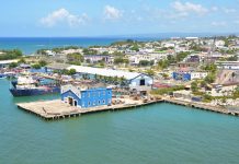 The 7 Best Dominican Restaurants in Hoboken for 2026: A Local’s Guide to Authentic Flavors Aerial view of Puerto Plata harbor with blue buildings, ships, and a coastal town in the Dominican Republic.