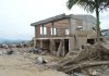 Partially destroyed building in Mocoa, Colombia, illustrating damage and abandonment.