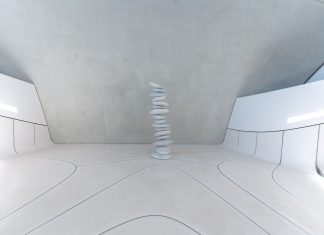 A minimalist and futuristic interior featuring stacked stones and white walls.