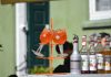 Colorful Aperol Spritz and Monin syrups on display outdoors, perfect for summer cocktails.