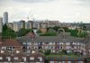Holland Gardens Reinvented: Mixed-Income Plan Aims to Keep Jersey City Residents Home Aerial view of residential buildings in Greater London showcasing urban housing.