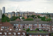 Holland Gardens Reinvented: Mixed-Income Plan Aims to Keep Jersey City Residents Home Aerial view of residential buildings in Greater London showcasing urban housing.