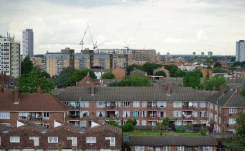 Holland Gardens Reinvented: Mixed-Income Plan Aims to Keep Jersey City Residents Home Aerial view of residential buildings in Greater London showcasing urban housing.
