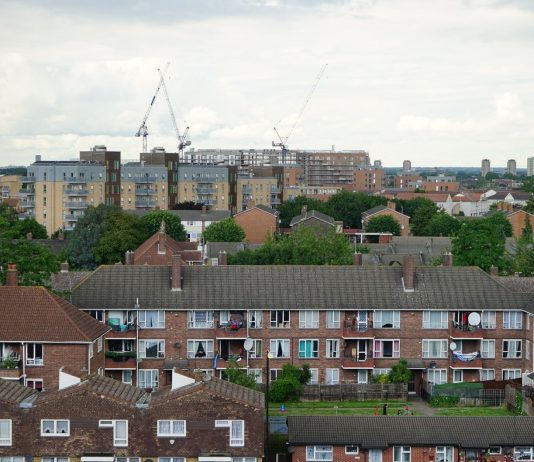 Aerial view of residential buildings in Greater London showcasing urban housing.