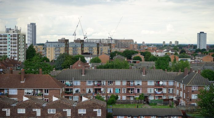 Holland Gardens Reinvented: Mixed-Income Plan Aims to Keep Jersey City Residents Home Aerial view of residential buildings in Greater London showcasing urban housing.
