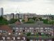 Holland Gardens Reinvented: Mixed-Income Plan Aims to Keep Jersey City Residents Home Aerial view of residential buildings in Greater London showcasing urban housing.