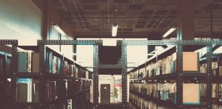 Bookshelves in a library with a vintage tone in San José, Costa Rica.
