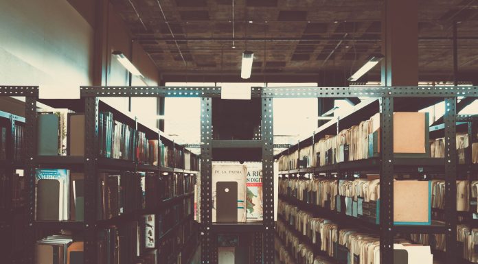 Bookshelves in a library with a vintage tone in San José, Costa Rica.