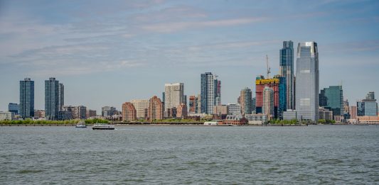 How Much Does It Cost to Rent in Jersey City in 2026? A Local’s Guide Breathtaking view of the New York City skyline captured from across the river.