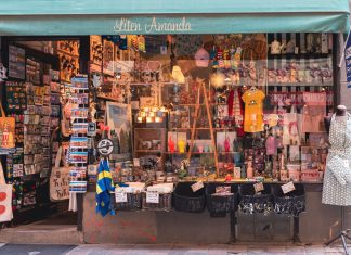Jersey City Tax Hikes: A Threat to Local Business Edge? A colorful display of Swedish souvenirs in a quaint shopfront in Stockholm's Gamla Stan district.