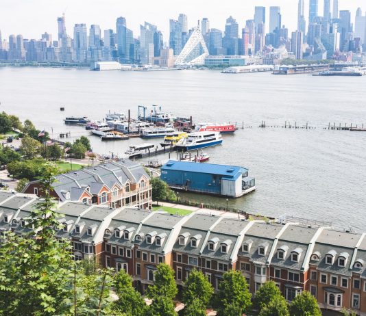 Aerial view of Edgewater, NJ overlooking the waterfront and Manhattan skyline.