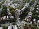 Las Mejores Iglesias en Jersey City para Visitar en 2026: Guía Completa de Fe y Comunidad Drone shot capturing a scenic Philadelphia neighborhood with a prominent church at the center.