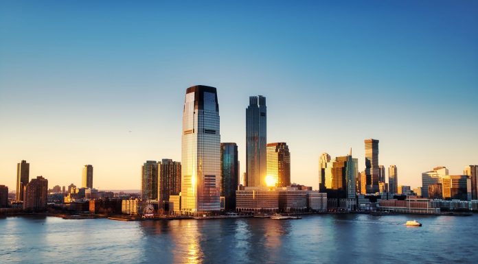 How Much Does It Cost to Rent in Union City in 2026? A Local’s Guide Breathtaking sunrise view over New York City skyline with reflection on the water.