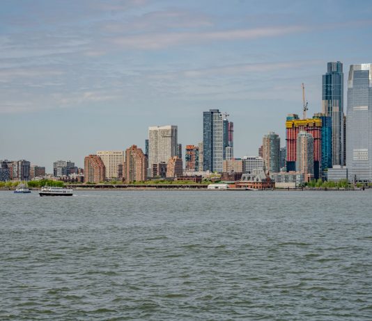 Breathtaking view of the New York City skyline captured from across the river.