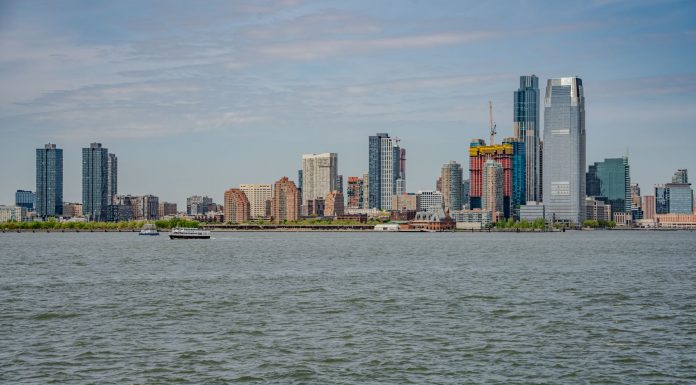 Breathtaking view of the New York City skyline captured from across the river.