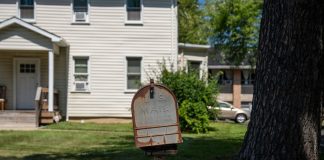 Best Areas to Raise a Family in Newark: A Local’s Guide for 2026 A vintage US mailbox stands outside a suburban home in New Jersey, illustrating classic American life.